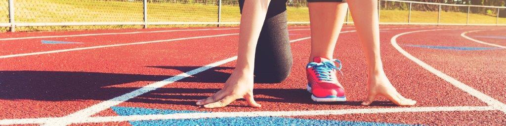 Runner on her mark at the beginning of a race