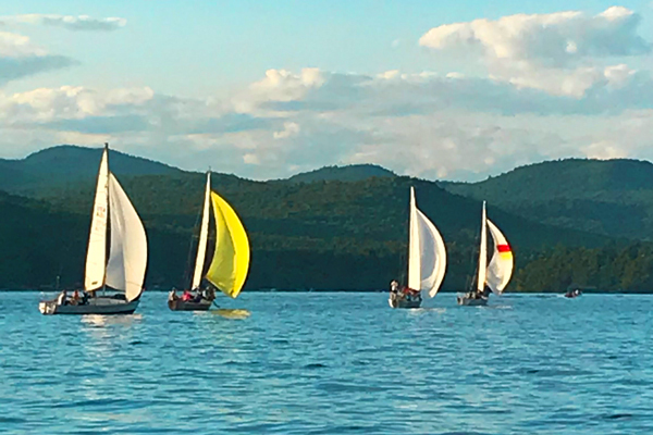 Sailboats sailing on Lake George