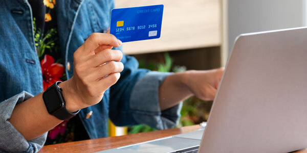 person paying estimated tax online using debit card