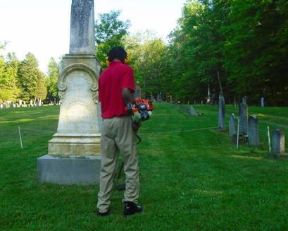 A resident of Finger Lakes Residential Center works at Kings Cemetary