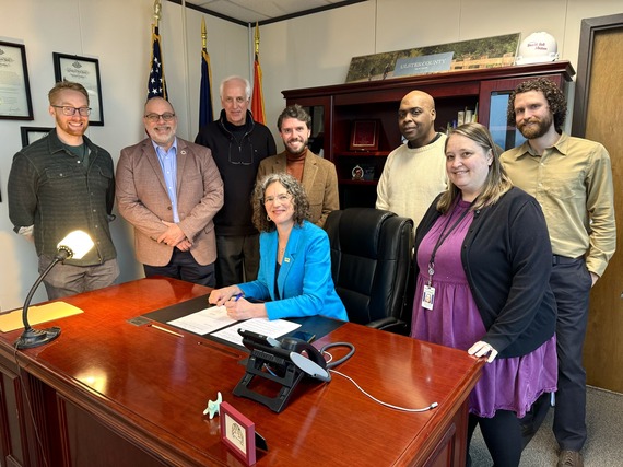 Signing Reso to Name County Floor After Former County Clerk Nina Postupack