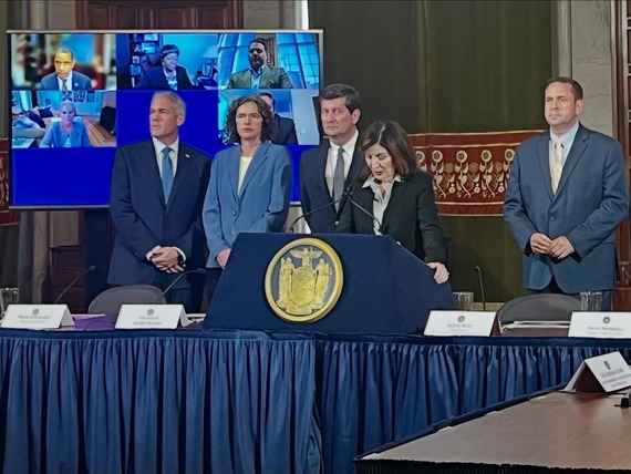 County Executive Metzger standing with other NY County Executives behind Governor Kathy Hochul as she addresses the meeting on political violence