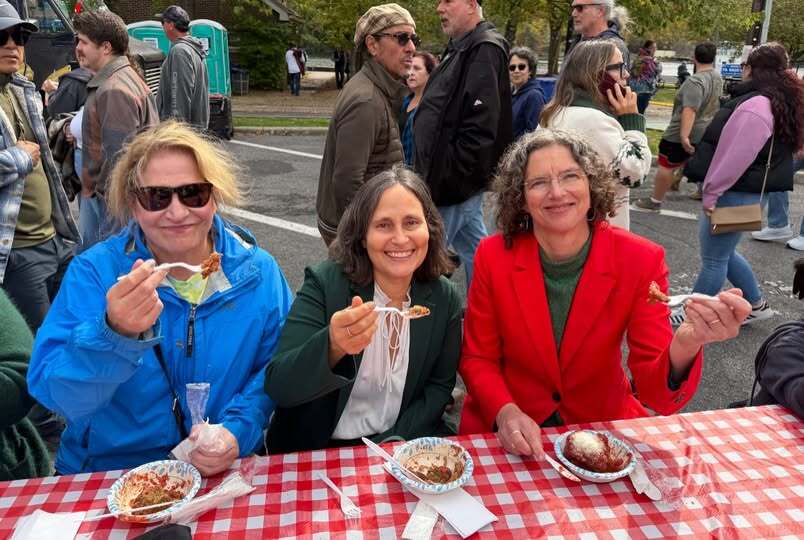 Executive Metzger with a Giant Graziano's Meatball at the Italian Festival