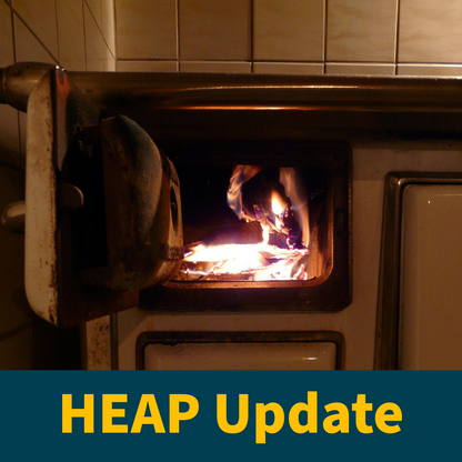 Picture of a Woodstove Saying "HEAP Update"
