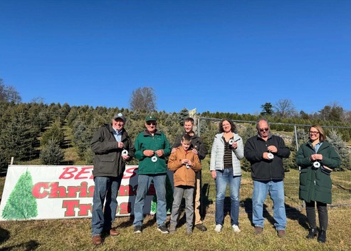 County Executive Metzger with NYS Agriculture and Markets Commissioner Richard Ball and the Bell family at Bell's Christmas tree farm