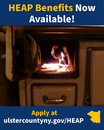 "Heap benefits open now" over an image of a woodstove