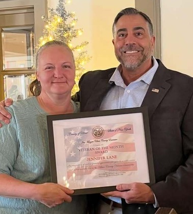 VSA Director Cozzupoli and Vet of the Month Jennifer Lane