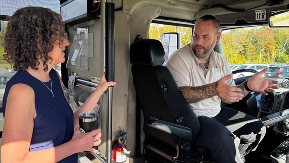 County Executive Metzger talking to a UCAT bus driver