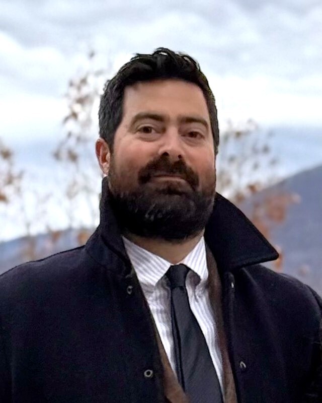 Headshot of Joshua Stratton-Rayner