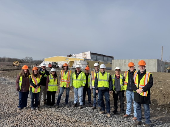 County Executive Metzger with County Officials and construction staff outside the ECC