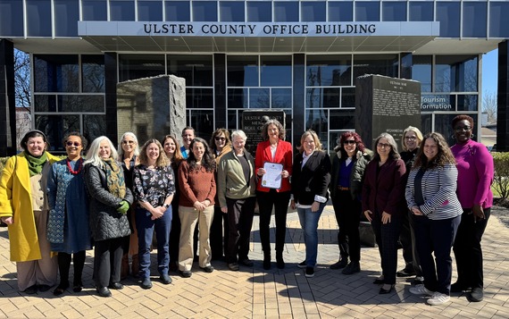 Group photo of women County leaders outside the County Office Building
