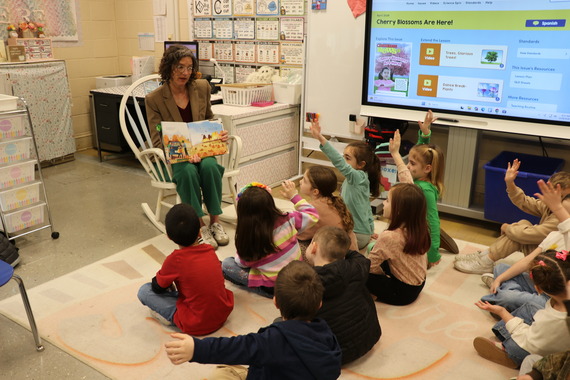 County Executive Metzger reading to a first grade class at Ostrander Elementary