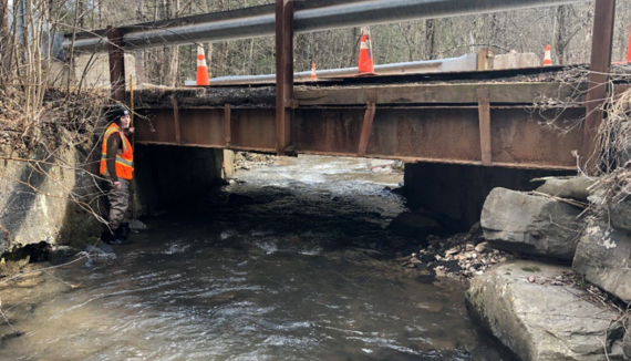 A bridge having work done over the Esopus Creek