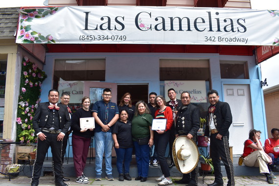 County Executive Metzger with the owners and staff of Las Camelias and the mariachi band out front of Las Camelias