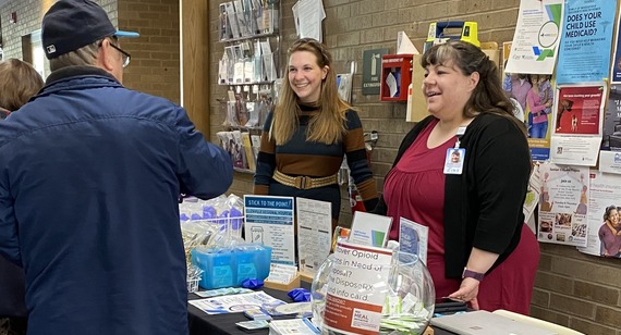 County staff tabling at the Trudy Center about opioid safety and response