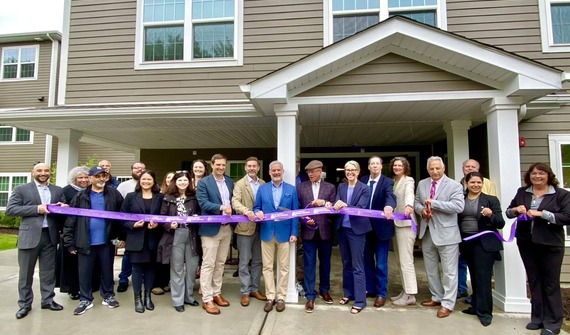 County Executive Metzger and other other local officials cutting the ribbon on Silver Gardens