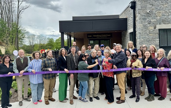 County Executive Metzger with County, City, State officials and Family of Woodstock leaders cutting the ribbon on Seedling child care