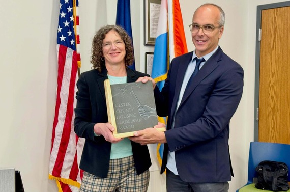 County Executive Metzger presenting Supervisor Rogers with the Ulster County Housing Leadership Award
