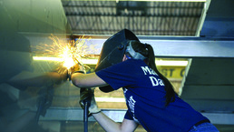 A woman welding
