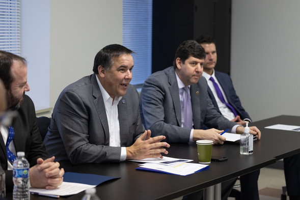 Mayor Ginther sits next to Director Steven Dettelbach at a gun violence roundtable