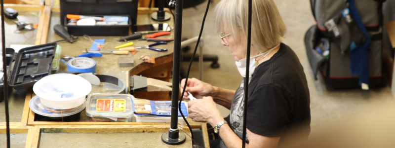 Woman in jewelry making class 