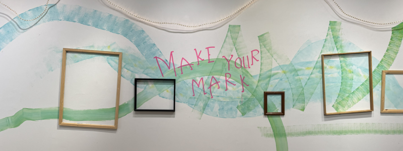 Art gallery wall that says make your mark
