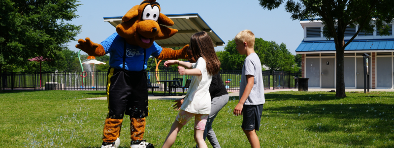 KIds playing with mascot