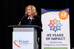 Director Kara Wente speaking at the PCSAO conference.