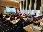 Tara Shook is presenting to a conference room filled with social workers and fatherhood practictitioners at the Montgomery County Fatherhood Summit