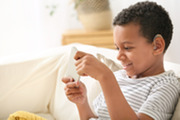Child with hearing aid