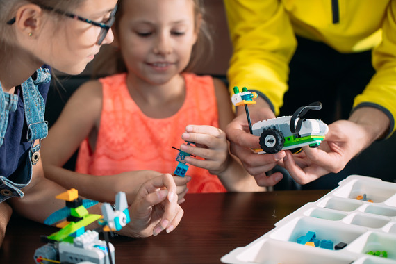 stem teacher engaged with students