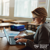 Adult using a computer.