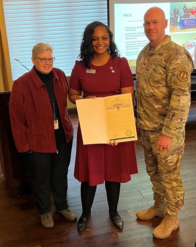 Photo showing group sharing Month of the Military Child proclamation