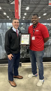 Franklin County Auditor Michael Stinziano presents a certificate to Floor & Decor 