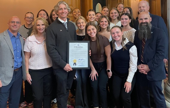The university of Akron swim and dive team in the Ohio House Chamber