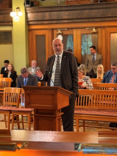 Rep. Click testifying in the Senate