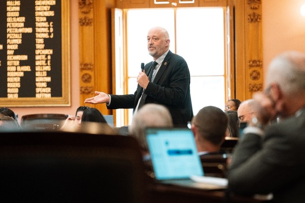 Rep. Click speaking
