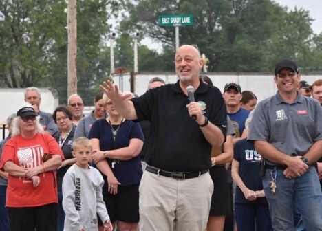Rep. Click with a microphone