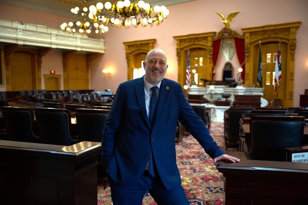 Rep. Click standing in house chamber