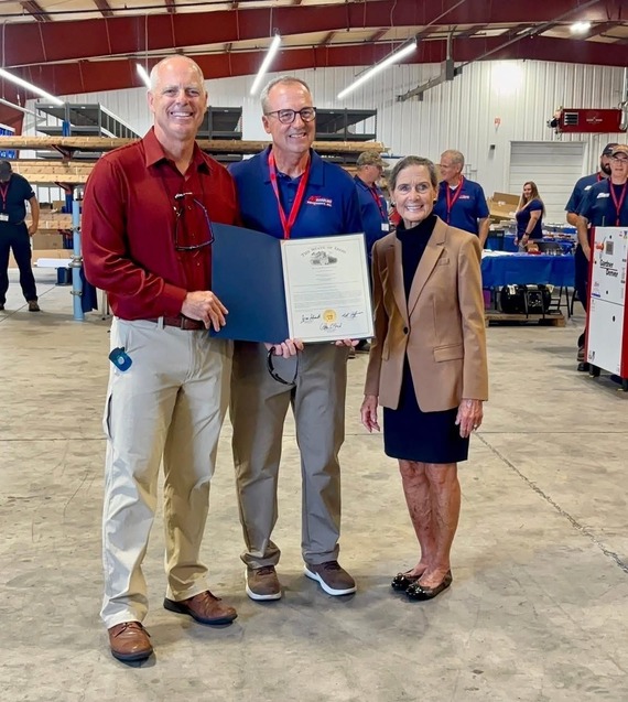 Rep. Bird presenting a commendation
