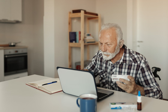 man looking at computer