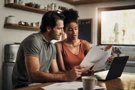 picture of couple working on laptop