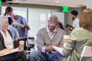 picture of older adults in a meeting about Medicare