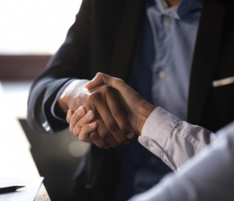 picture of 2 people shaking hands