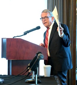 Governor DeWine displays a proclamation acknowledging Ohio's small businesses during Small Business Week