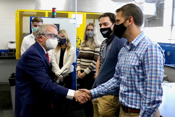 Governor DeWine learns more about glass production on a tour of Libby Glass in --.