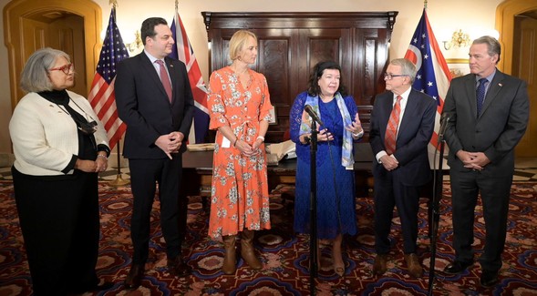 Governor DeWine, Lt. Governor Husted, and Director of Ohio Department of Development Lydia Mihalik stand next to Dame Karen Pierce.