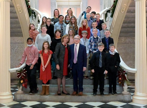 Governor DeWine and First Lady DeWine pose alongside Cedarville Elementary students during their tour of the Statehouse.