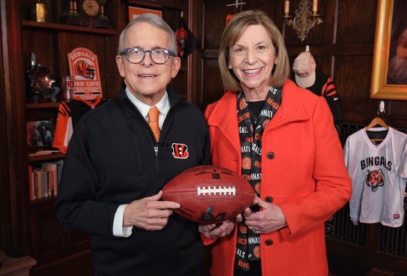 Governor DeWine and First Lady Fran DeWine pose with Bengals memorabilia as they prepare for the Super Bowl this weekend.
