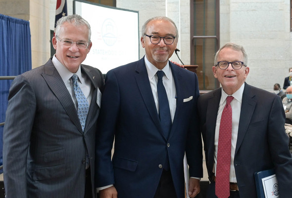 Governor DeWine poses with Doug Preisse and Michael Coleman.